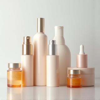 Assortment of sleek skincare bottles in various shapes and sizes, showcasing elegant packaging