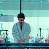 Scientist working diligently with advanced laboratory equipment, pipettes, and beakers